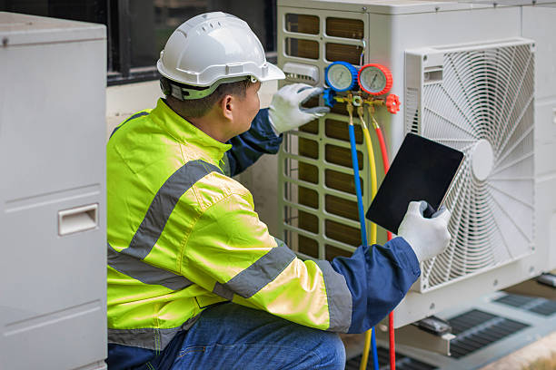 Professional Hvac technician working in Mathews, AL